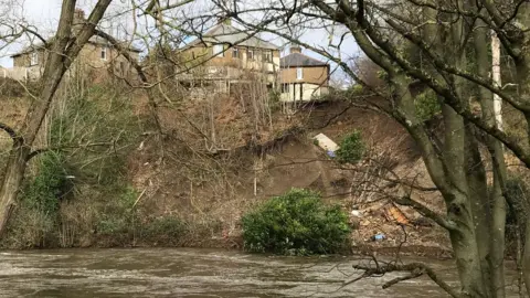 The houses with a landslide