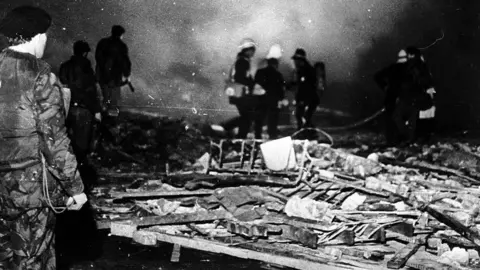 Pacemaker Members of the emergency services and security forces at the bomb scene