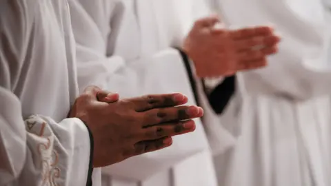 Getty Images Hands in prayer - generic