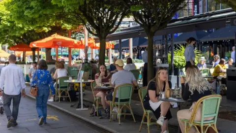 Getty Images People dining outside in Cardiff