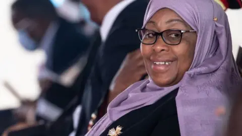 Tanzania's new president, Samia Suluhu, attends a service honoring President John Magufuli on March 26, 2021