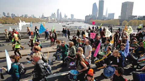 Tolga Akmen/AFP Climate change protestors