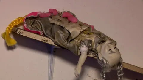 An abandoned Mimi doll