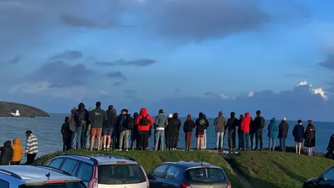 Glyn Winchester Crowds watching the whales