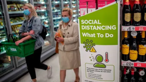 Getty Images Shoppers at Asda