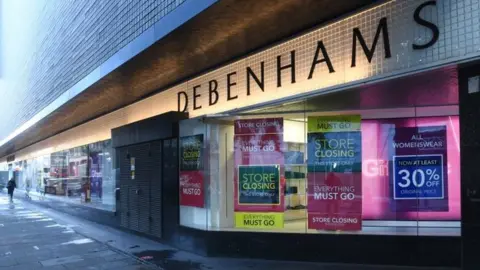 BBC Debenhams store in Oxford Street advertising its closing down sale in December 2020