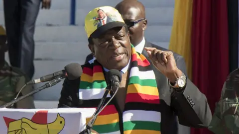 AFP Zimbabwean President Emmerson Mnangagwa addresses farmers and businessmen