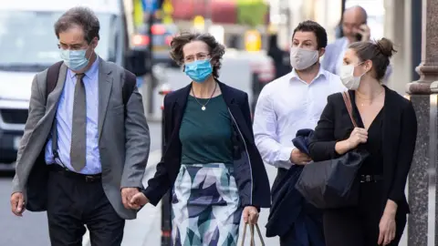 PA Media File pic of Jeremy Everard and other family members outside court