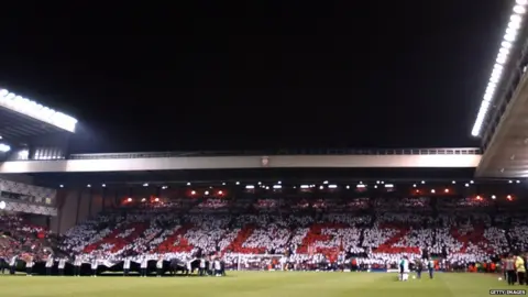 Getty Images Liverpool fans spell out 'Allez' in a mosaic