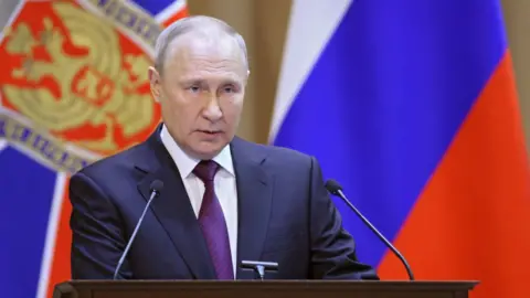 EPA Russian President Vladimir Putin delivers his speech during a meeting of the Federal Security Service (FSB) Board which sums up the 2022 performance of the FSB bodies and outlines the priority tasks for 2023