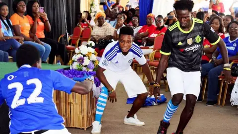 Living Streams International People recreating football match