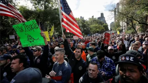 Reuters New York City Fire Department (FDNY) union members, municipal workers and others demonstrate during a protest against the city"s COVID-19 vaccine mandates on Manhattan"s Upper East Side in New York City, New York, U.S., October 28, 2021.
