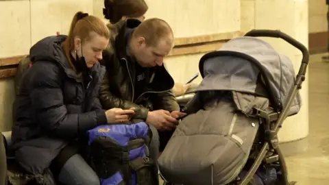 Family in metro