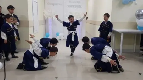 The local hospital opened only in December and local children were seen dancing in celebration