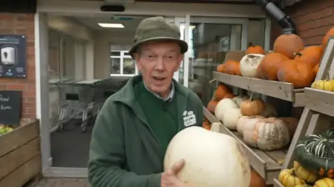 BBC Richard Simkin with a pumpkin