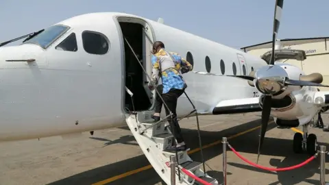 Ecg ministries Prophet Shepherd Bushiri entering a plane