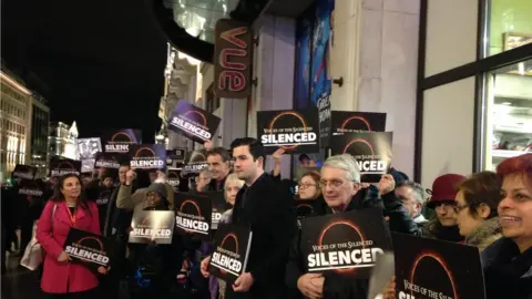 BBC Group with banners outside cinema