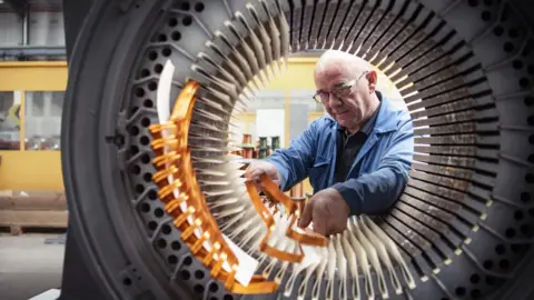 Getty Images Factory worker