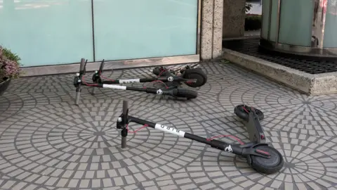 Getty Images Bird scooters on a street