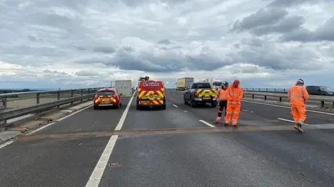 NAtional Highways Contractors marking out the eastbound carriageway on the M62 Ouse Bridge