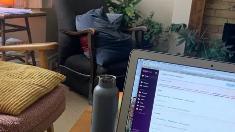 Vicky Price Vicky Price's living room and laptop