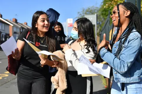 Jacob King / Reuters Students open their GCSE exam results