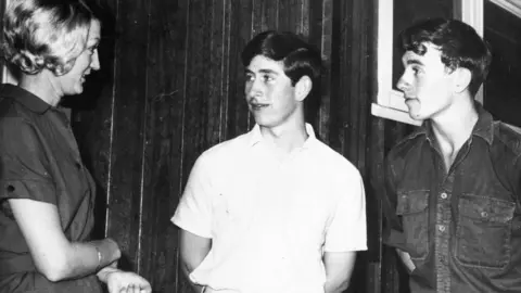 Getty Images The King as a boy with his roommate, Stuart McGregor, and a member of staff