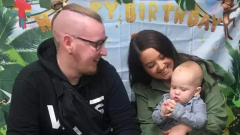 Alannah Alannah sat holding her baby son Odin, beside her partner Jaimie