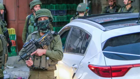 Getty Images Israeli soldiers at scene of incident (02/11/22)