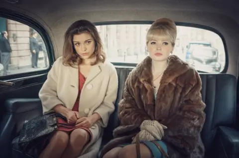 BBC Sophie Cookson playing Christine Keeler and Ellie Bamber playing Mandy Rice-Davies