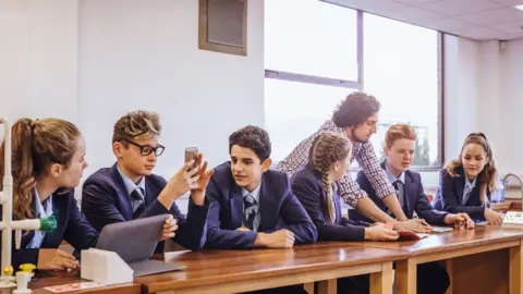 Getty Images Pupils in science class