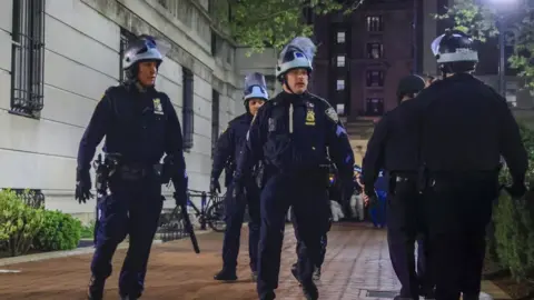 New York Police Department officers outside of Columbia University buildings
