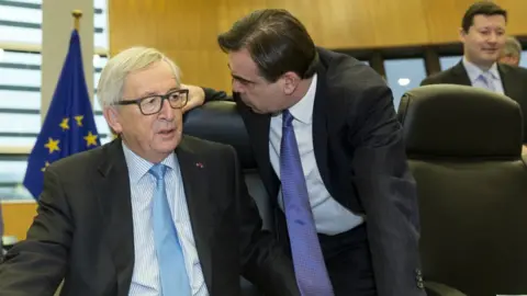 Getty Images Jean-Claude Juncker (l) talks with his spokesperson Margaritis Schinas on January 31, 2018 in Brussels