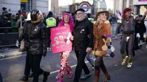 PA Media Nancy Sorrell and Jim Moir, better known as television personality Vic Reeves, take part in the Lord Mayor's Show