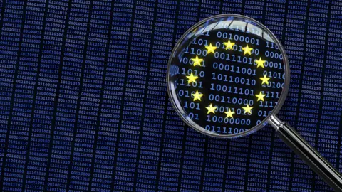 Getty Images Illustration of binary digits and the EU logo under a magnifying glass