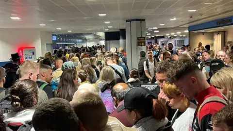 LUKE THOMPSON MANCHESTER AIRPORT QUEUES