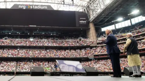 Getty Images Narendra Modi said Donald Trump attend a mass rally in Texas