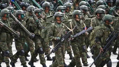 AFP The Venezuelan army march during a military parade to celebrate independence day in Caracas in July 2023