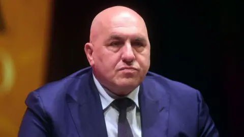 Getty Images Italy's defence minister Guido Crosetto pictured in May at the Trento Economy Festival in Trento, Italy