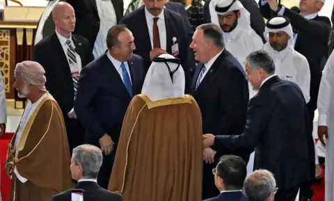 Getty Images US Secretary of State Mike Pompeo and Turkish Minister of Foreign Affairs Mevlut Cavusoglu in Doha