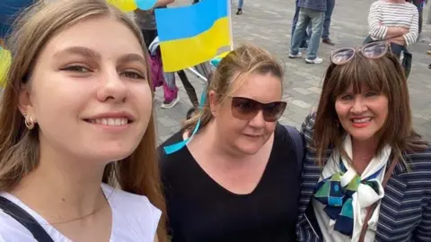 Ferguson family Lorraine Ferguson (right) says more hosts are needed to help people flee Ukraine