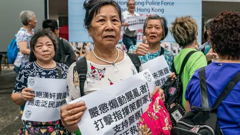 Getty Images Pro-Hong Kong police supporters on 22 June