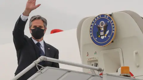 Getty Images U.S. Secretary of State Antony Blinken boards his plane at New Delhi