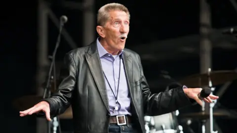 Getty Images Barry Chuckle performing at Camp Bestival at Lulworth Castle in 2016.