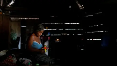 Reuters Elvira Choc, grandmother of Jakelin Caal, holds a toy as she waits for the arrival of her granddaughter"s coffin in San Antonio Secortez village, Guatemala, December 22, 2018