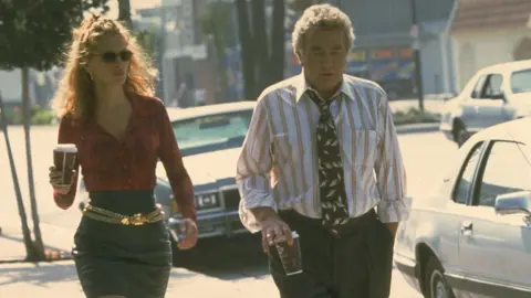 Getty Images Finney with Julia Roberts in Erin Brockovich