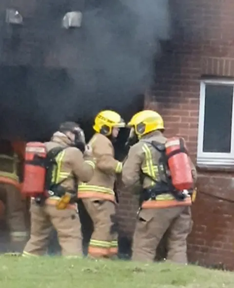 Peter Varty Firefighters at fire in Oak Square, Gateshead