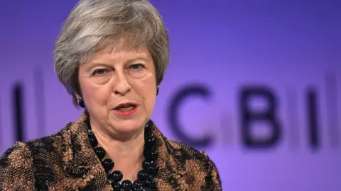EPA Theresa May speaking at the CBI conference