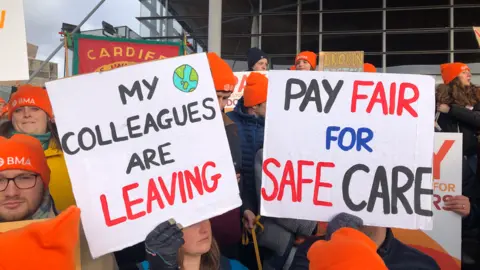 BBC Junior doctors gathered outside the Senedd in Cardiff Bay on Tuesday