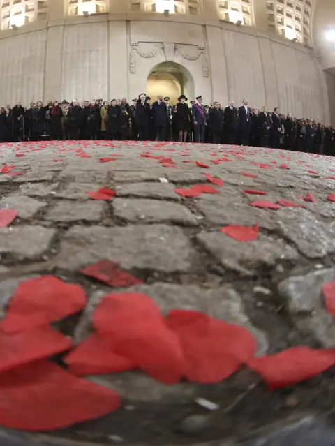 EPA King Philippe of Belgium and Queen Mathilde (C) during the Last Post ceremony as part of the Centenary of the WWI Armistice of 11 November 1918 at Menin Gate Memorial, in Ypres, Belgium.